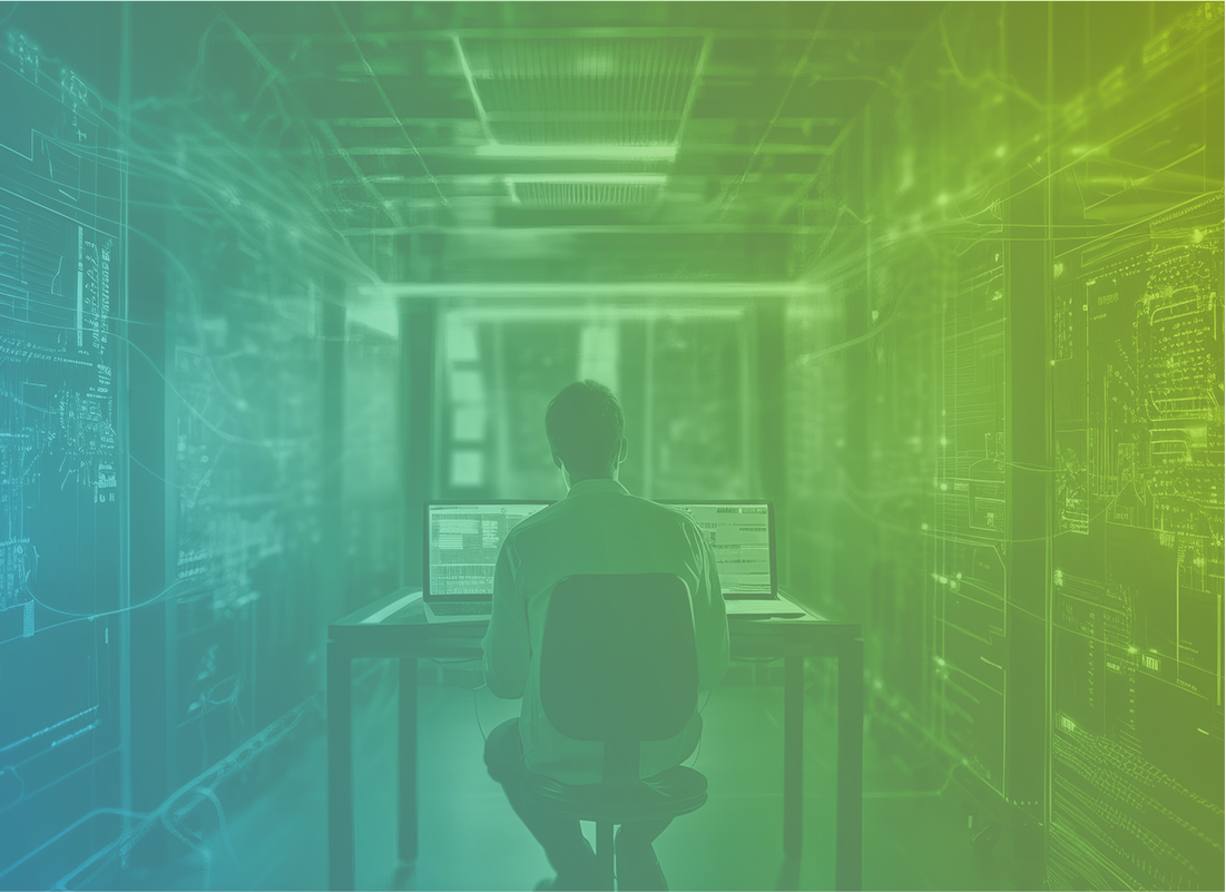 The Real ROI of Managed IT Services ROI of Managed IT Services. IT provider sitting at computer in digital server room.