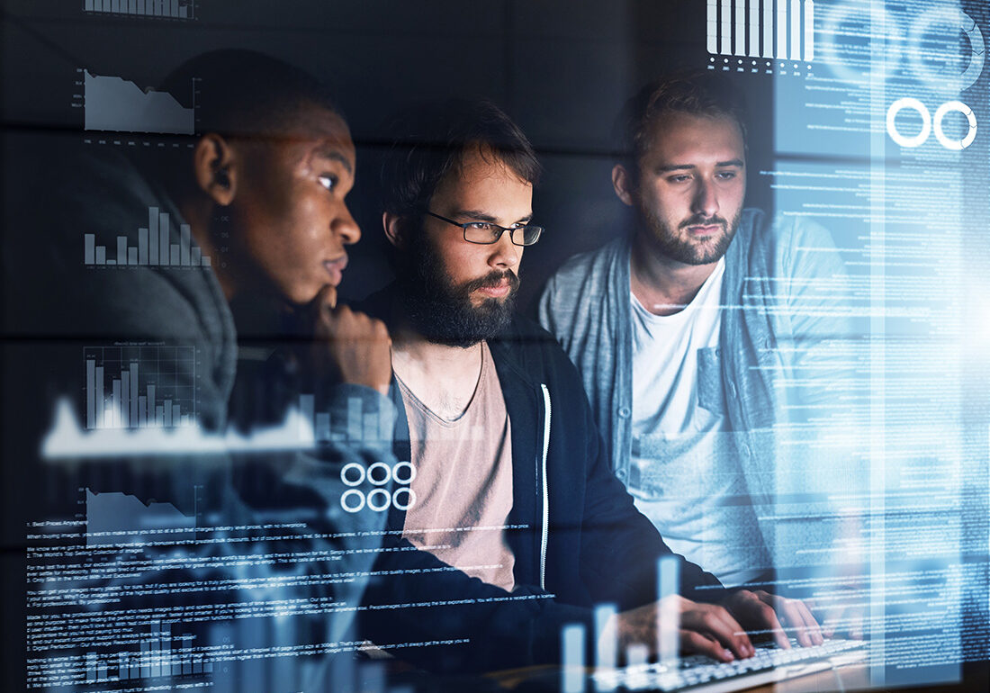 Strategic use of IT. The Tech Team Should Be Central to Business Strategy. Programming hologram, man and team with computer at night for typing source code or graph data. Software development, group and web developer with cybersecurity analytics, database hacking and charts.